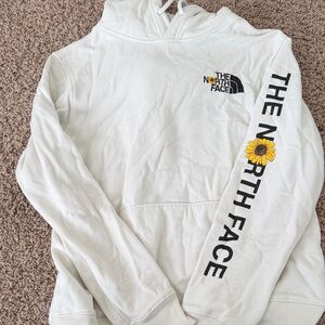 The North Face White Pullover Hoodie with Sunflower Sleeve Print
